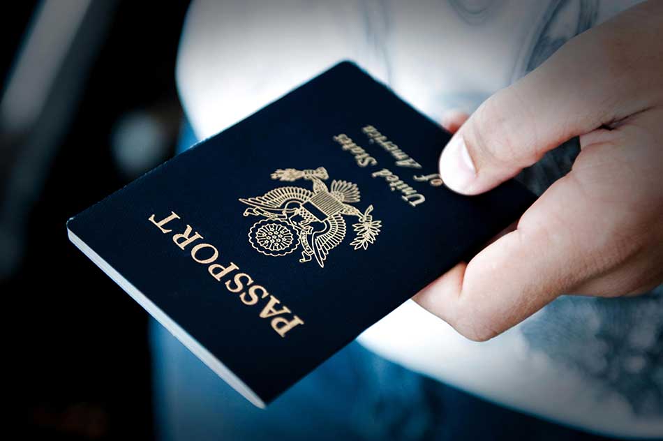 Passport office is months behind schedule